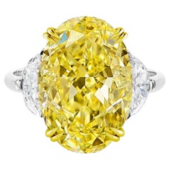 GIA Certified 5.66 Carat Fancy Yellow Oval Diamond Ring with Half Moon