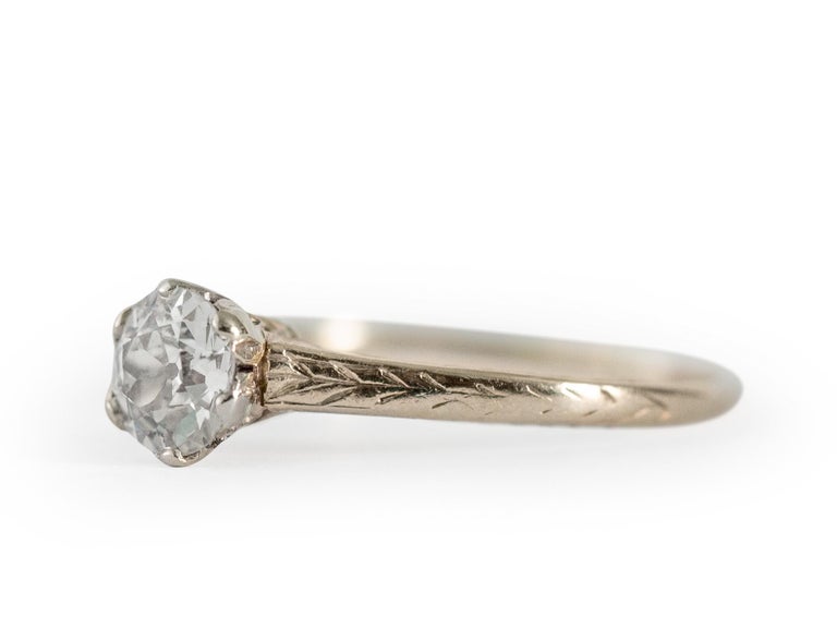 Ring Size: 7.5
Metal Type: 18k white gold [Hallmarked, and Tested]
Weight: 2.8  grams

Center Diamond Details:
GIA REPORT#2205551494
Weight: .57 carat
Cut: Old European Brilliant
Color: J
Clarity: SI1

Finger to Top of Stone Measurement: