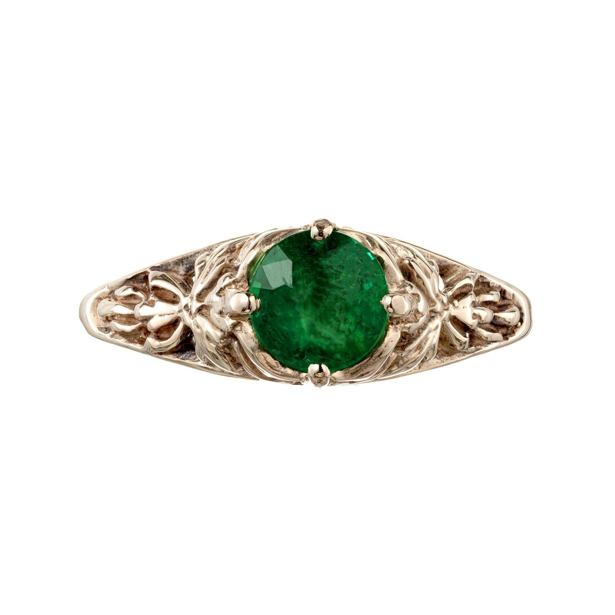 Bright green natural round emerald engagement ring. In a pierced open work 14k yellow gold engagement setting. 

1 round bright green emerald, approx. .57cts GIA Certificate # 6203194646
Size 6.75 and sizable
14k yellow gold 
Stamped: 14k
2.1 grams