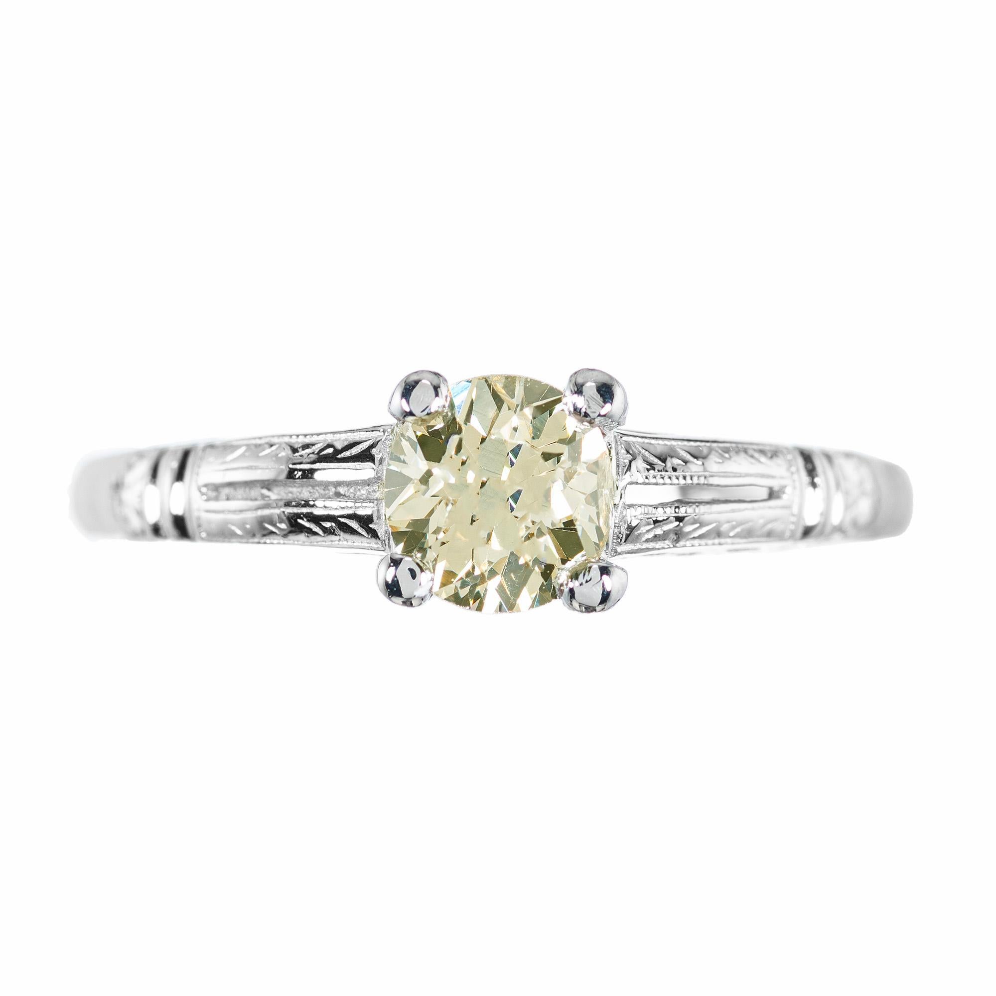Original 1930s Art Deco natural light brown diamond old European cut Platinum engagement ring. GIA Certified .57 Carat Old European Diamond. The GIA has graded it as lit brown, it looks more like a light yellow. With its intricate detailing and