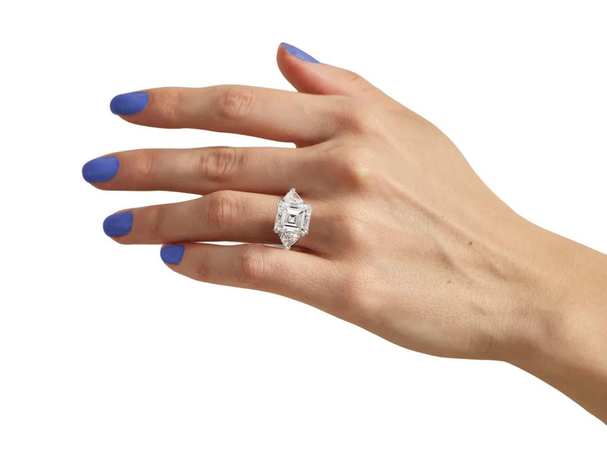 Anillo de tres piedras con diamantes de 5 quilates certificado por el GIA
F COLOR
I Claridad SIN FALLAS

