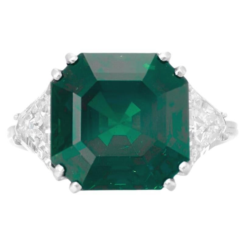 Contemporary GIA Certified 5.70 Carat Green Emerald Diamond Ring For Sale