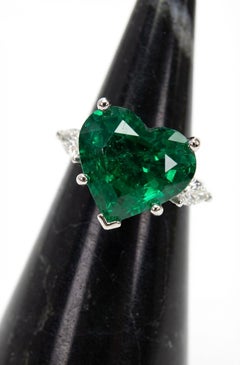 GIA Certified 5.73 Carat Heart-Shape Emerald and Diamond Three-Stone Ring