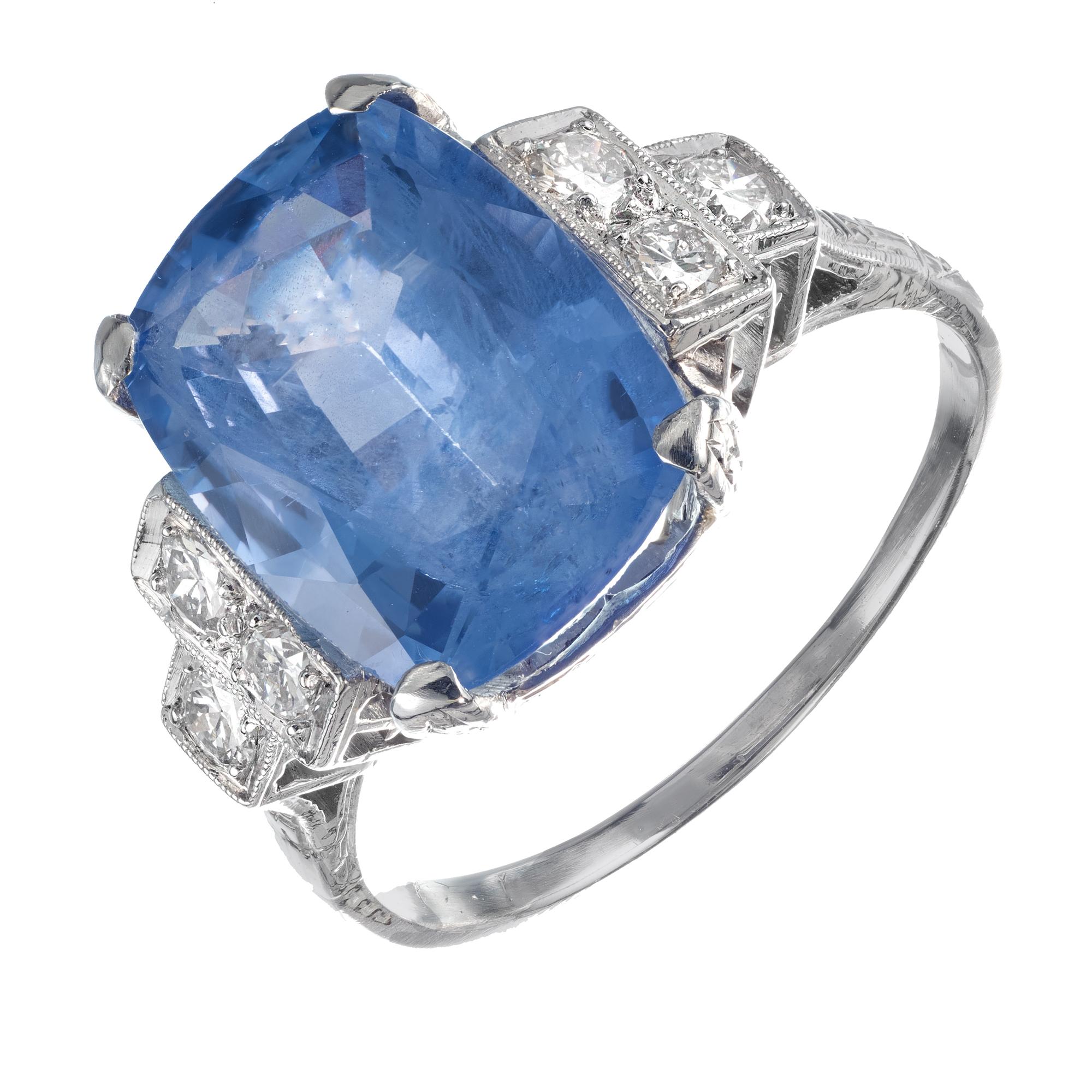 Original 1930's sapphire and diamond engagement ring. The center is set with a medium blue simple heat only sapphire. GIA certified from Sri Lanka. Platinum setting with 6 round accent diamonds. 

1 cushion shape light blue I sapphire, Approximate