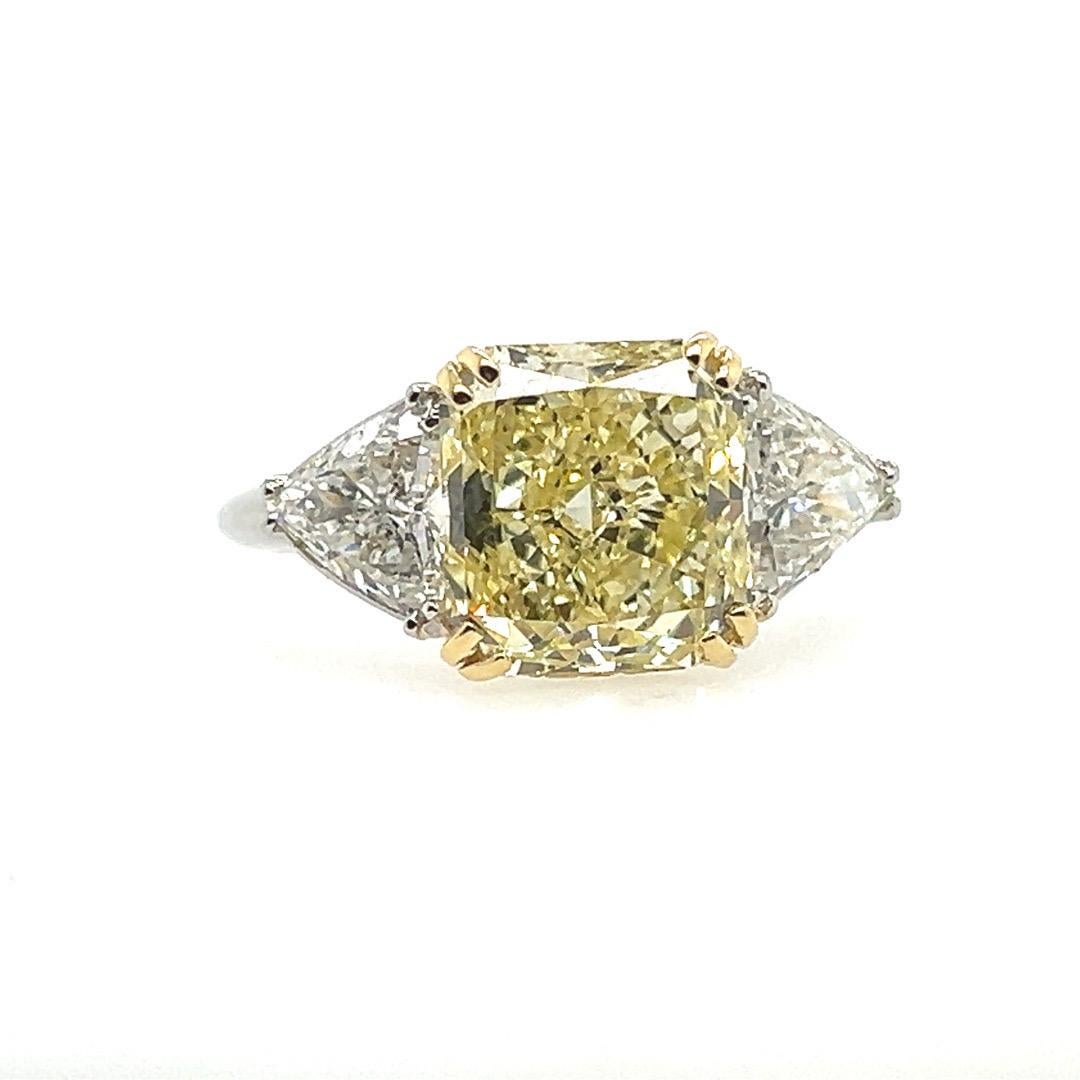 Modern GIA Certified 5.75 Carat Fancy Light Yellow Natural Diamond Plat Engagement Ring For Sale