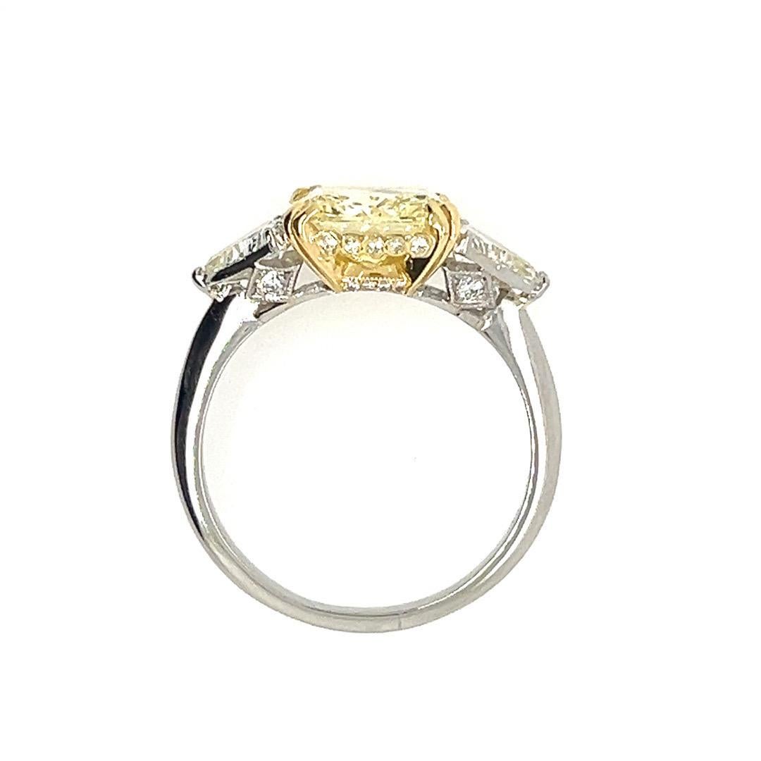 GIA Certified 5.75 Carat Fancy Light Yellow Natural Diamond Plat Engagement Ring In Good Condition For Sale In Los Angeles, CA
