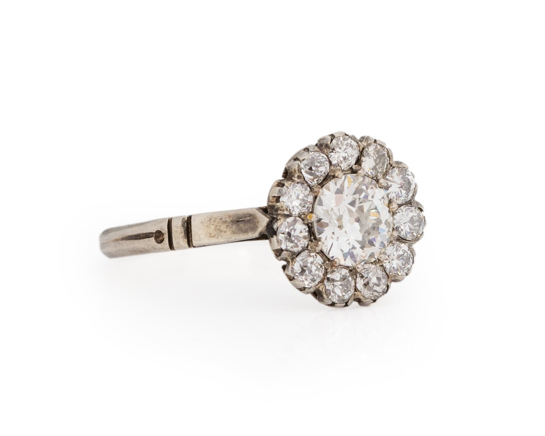 Ring Size: 6
Metal Type: 18K White Gold [Hallmarked, and Tested]
Weight: 2.5 grams

Center Diamond Details:
GIA REPORT #: 2211891931
Weight: .58carat
Cut: Old European brilliant
Color: I
Clarity: VS2
Measurements: 5.56mm x 5.42 x 3.04mm

Side Stone