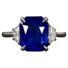 GIA Certified 5.80 Carat Blue Sapphire Diamond Ring