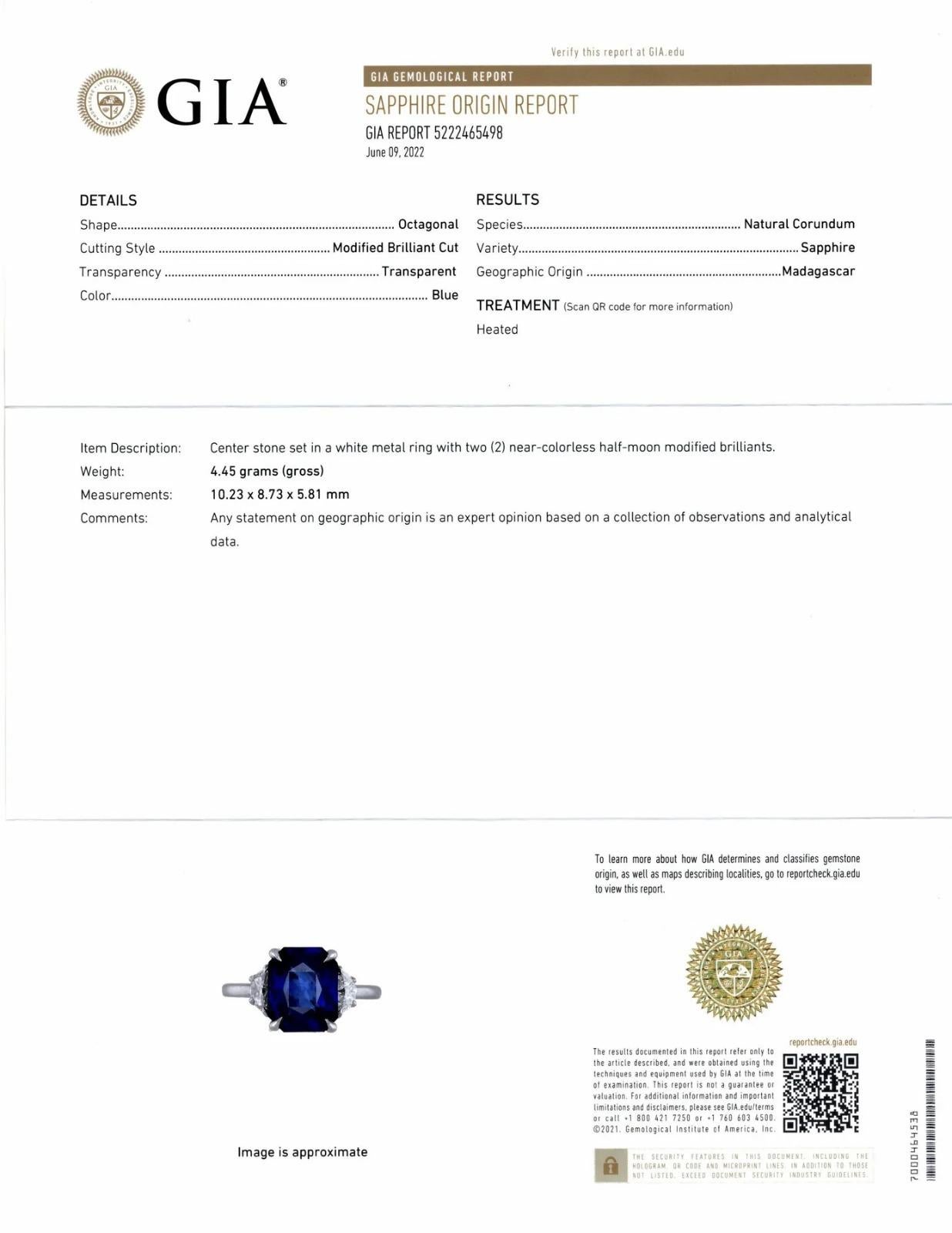 GIA certified sapphire and diamond ring features a gorgeous sapphire center stone accented by half moon diamond accents. The color of the substantial 5.30ct radiant sapphire is a vibrant and rich royal blue hue! It is paired with an elegant sleek