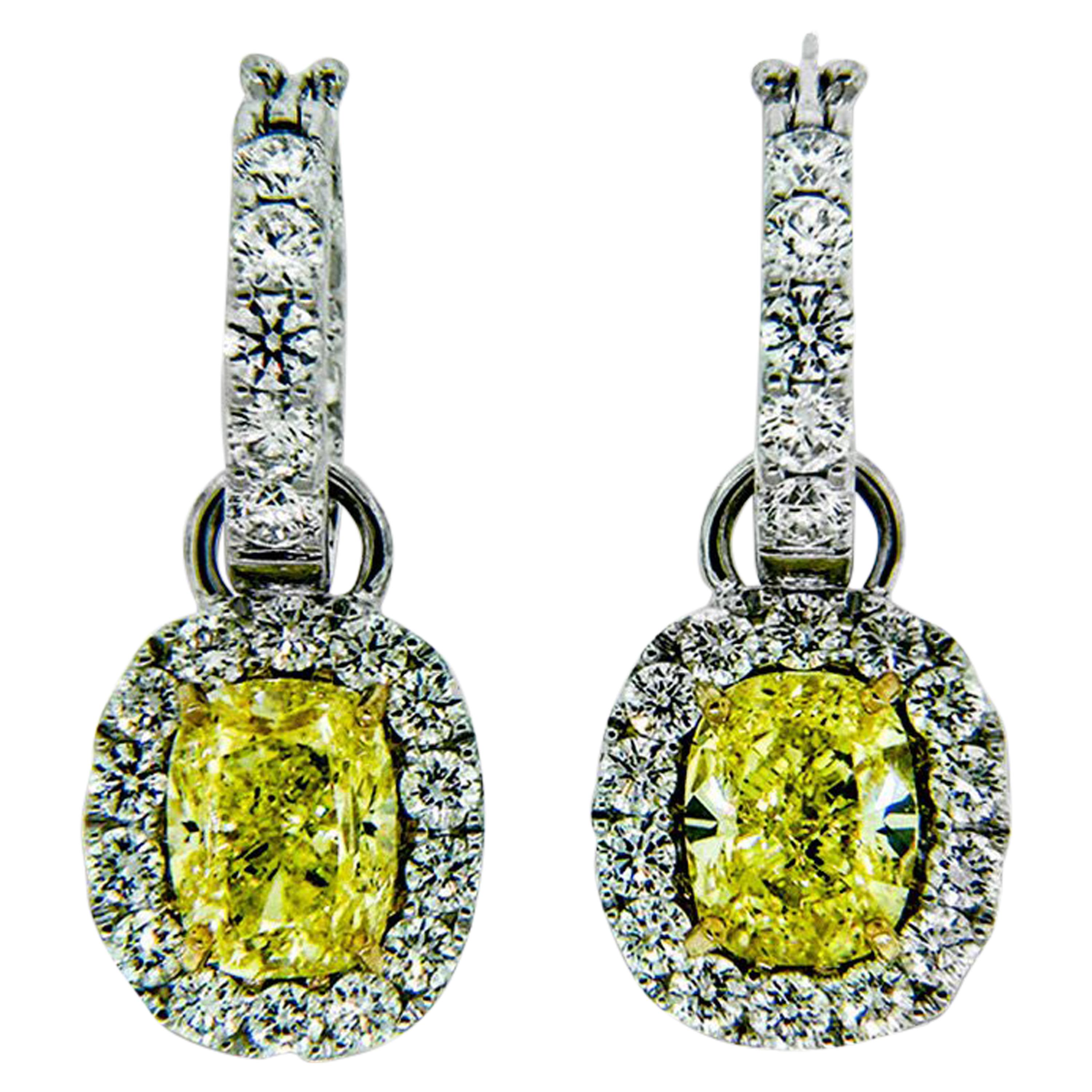 GIA Certified 5.86 Carat Fancy Intense Yellow or VS2 Diamond Earrings