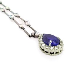 GIA Certified 5.87 Carat Pear Shape Tanzanite Necklace with 5.75 Carat Diamonds