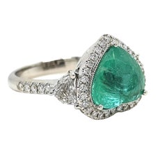 Anello in oro bianco con tormalina Paraiba certificata GIA da 5.93 carati e diamanti fantasia