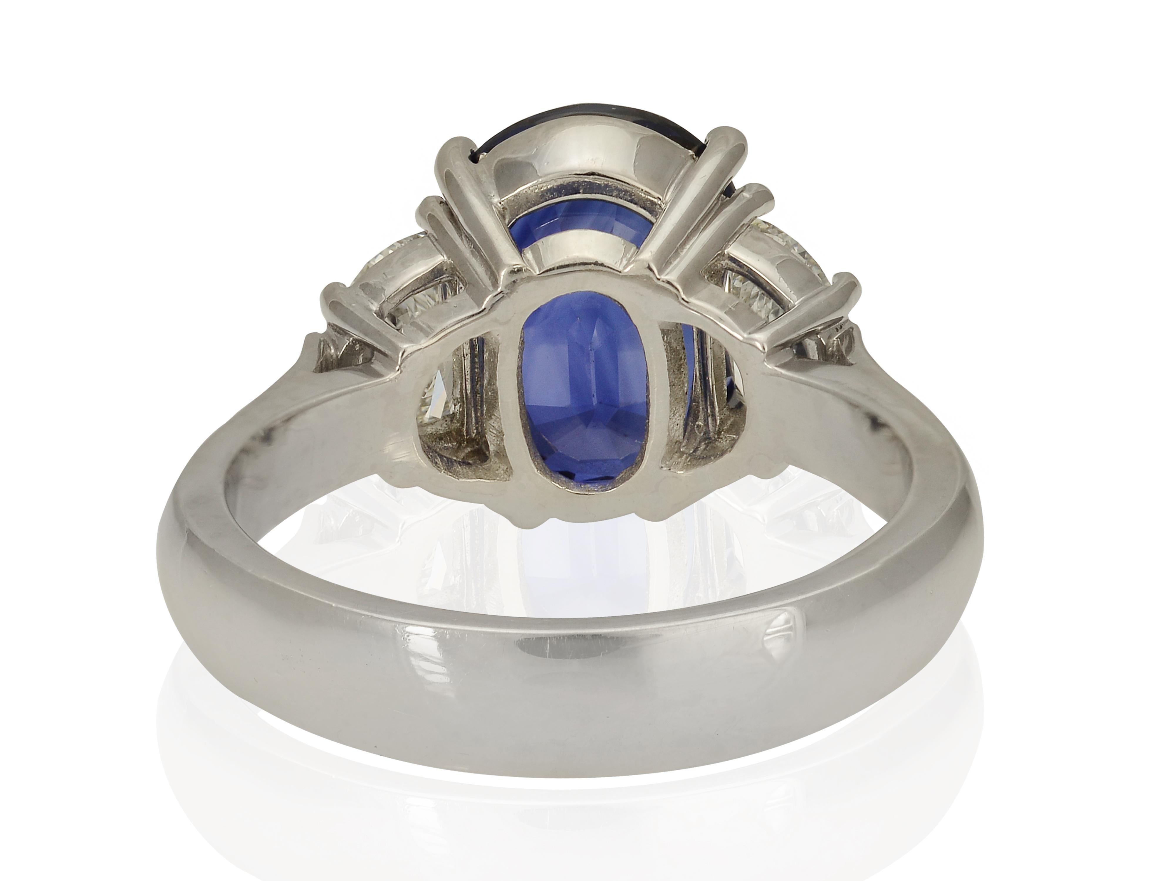 Contemporary GIA Report Certified 5.93 Carat Royal Blue Oval Sapphire Cocktail Ring For Sale