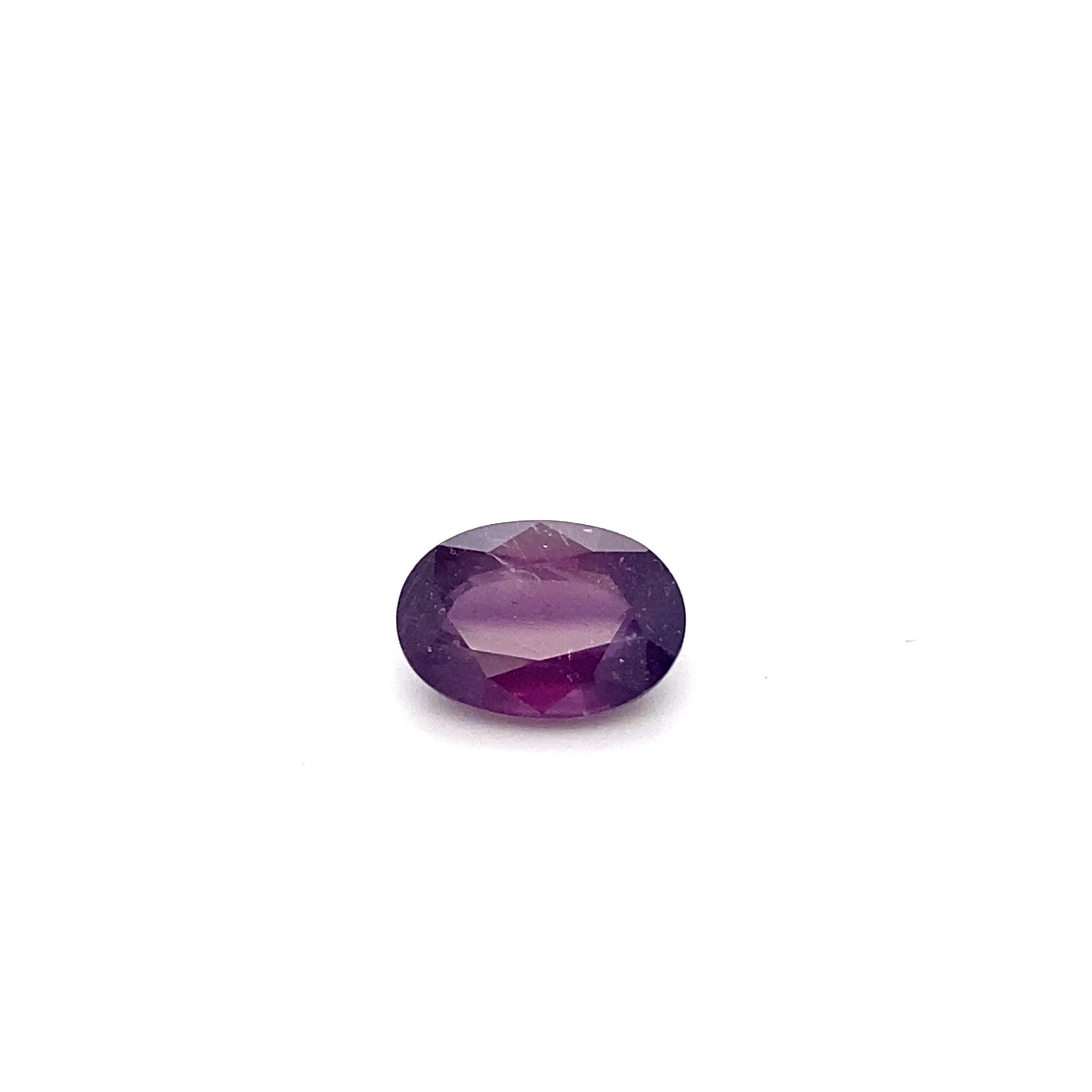 GIA certified 5.94 carat oval shape natural pink purple sapphire is a truly breathtaking loose gemstone. Originated in East Africa and NO HEAT makes it a highly desirable piece. It is hand cut in step cut style and hand polished by skilled