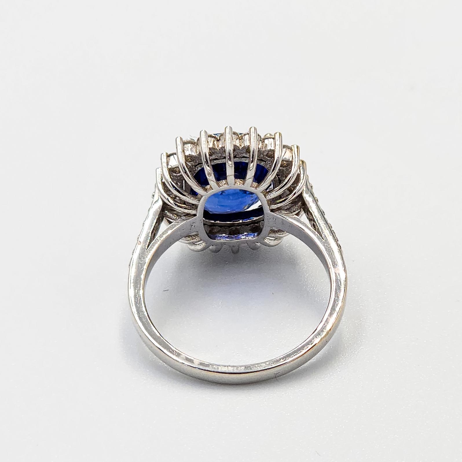 Contemporary GIA Certified 5.18 Carat Velvet Blue Sapphire Ring with Diamonds in 18k Gold For Sale