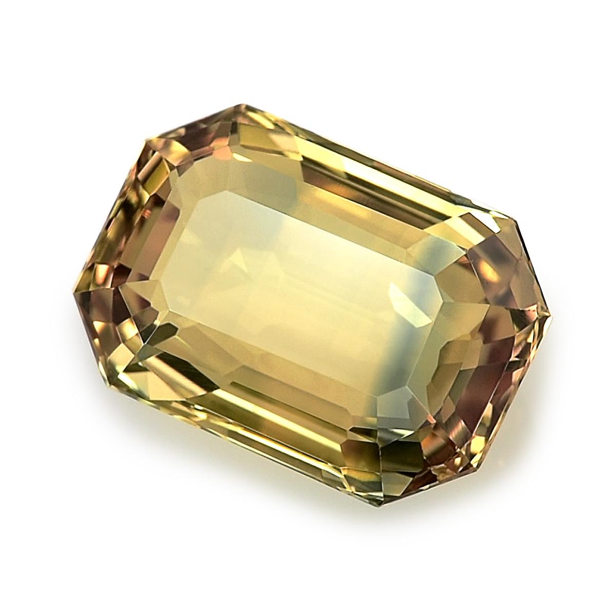 Emerald Cut GIA Certified 5.99 Carats Unheated Orangy Yellow Blue Sapphire  For Sale