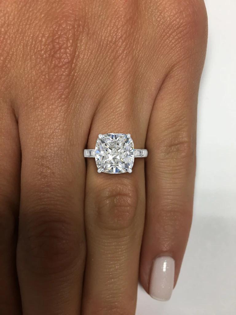 An exquisite 3 carat cushion cut diamond that has been cut in a form with many facets, so it can have exceptional brilliance and maximized light that is returned through the top of the diamond. 

This  cushion cut diamond is considered the “ideal”