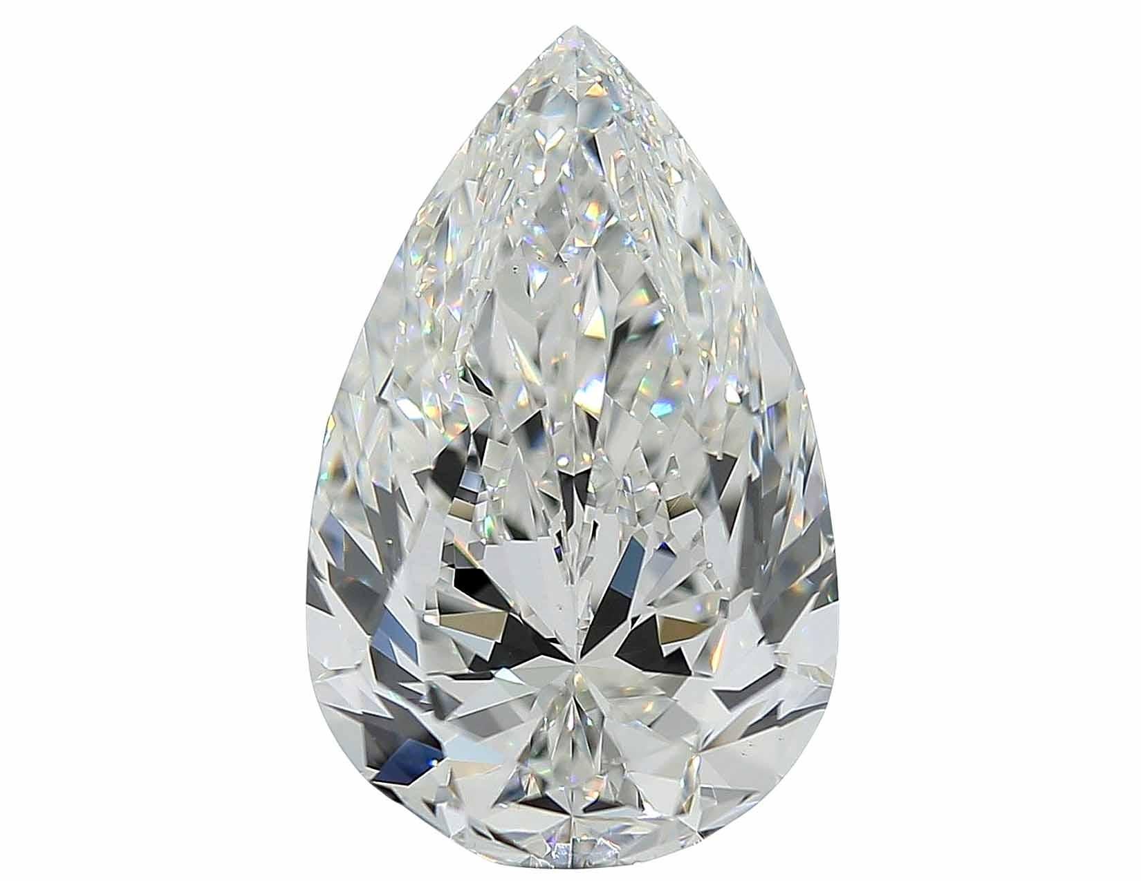 Contemporary GIA Certified 6.01 Carat Pear Cut Diamond F Color Ring with tapered baguette For Sale