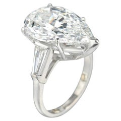 GIA Certified 6.01 Carat Pear Cut Diamond F Color Ring with tapered baguette