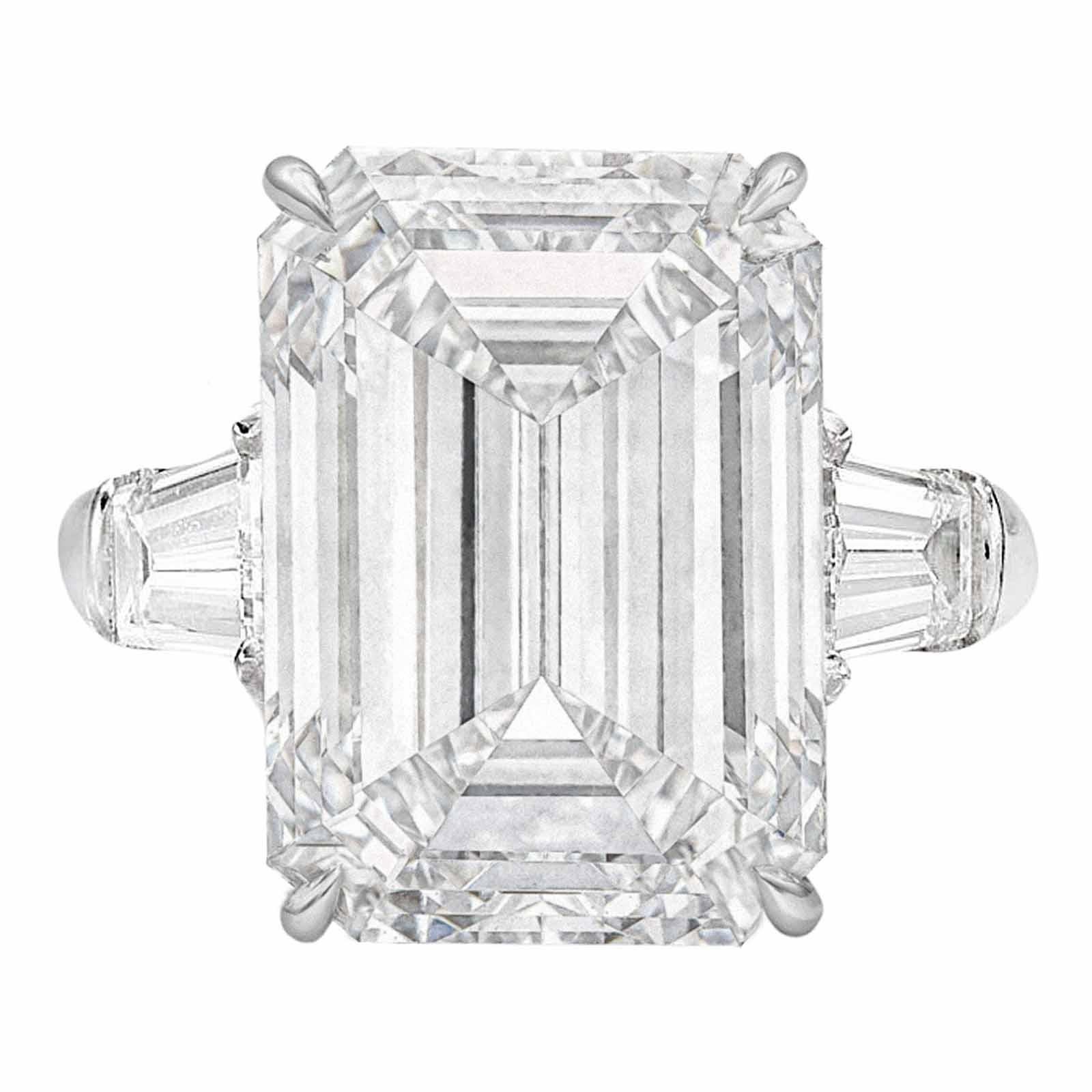 Modern GIA Certified 7 Carat Emerald Cut Diamond Ring VVS2 Clarity F color For Sale
