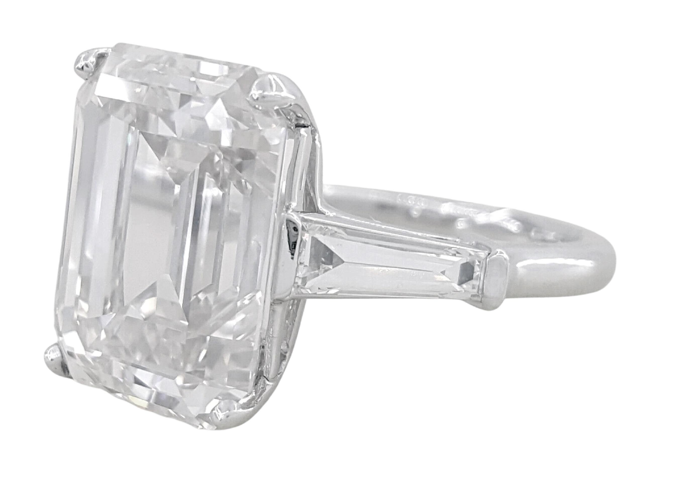 Contemporary GIA Certified 6 Carat Emerald Cut Diamond Platinum Ring with tapered baguette For Sale
