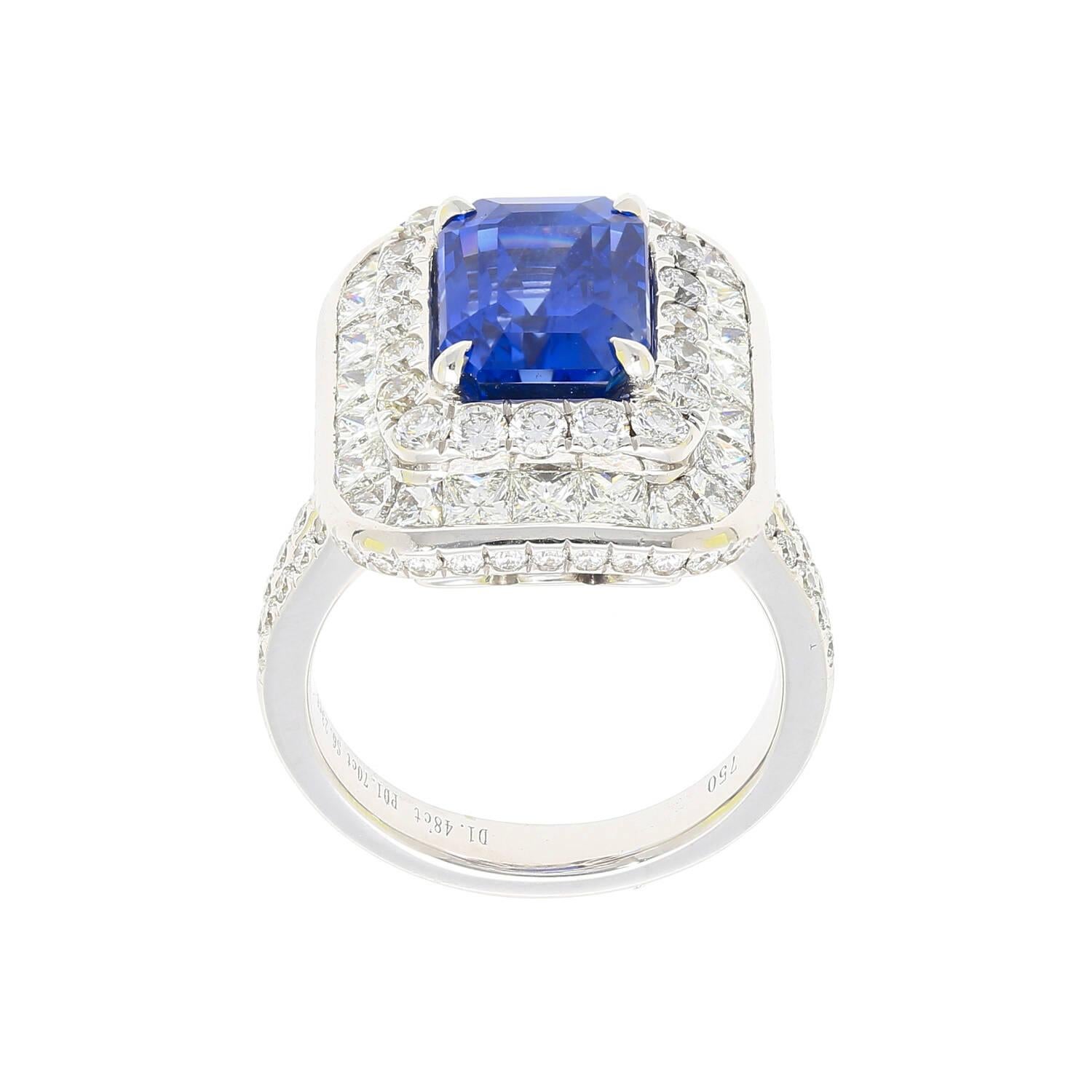 Shop this 6.26 carat no heat Burma Blue Sapphire and mixed-cut diamond cocktail ring. The center stone is a gorgeous emerald cut that radiants vibrant deep blue color hues. A rare gem considering it has no heat treatment of any kind. Set with 2.58