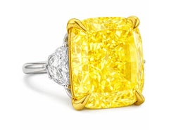 GIA Certified 6.35 Carat Fancy Intense Yellow Cushion Cut Diamond Ring