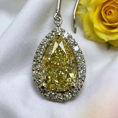 GIA Certified 6 Carat Fancy Yellow Pear Diamond Halo Drop Earrings