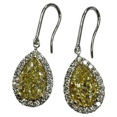 GIA Certified 6 Carat Fancy Yellow Pear Diamond Halo Drop Earrings