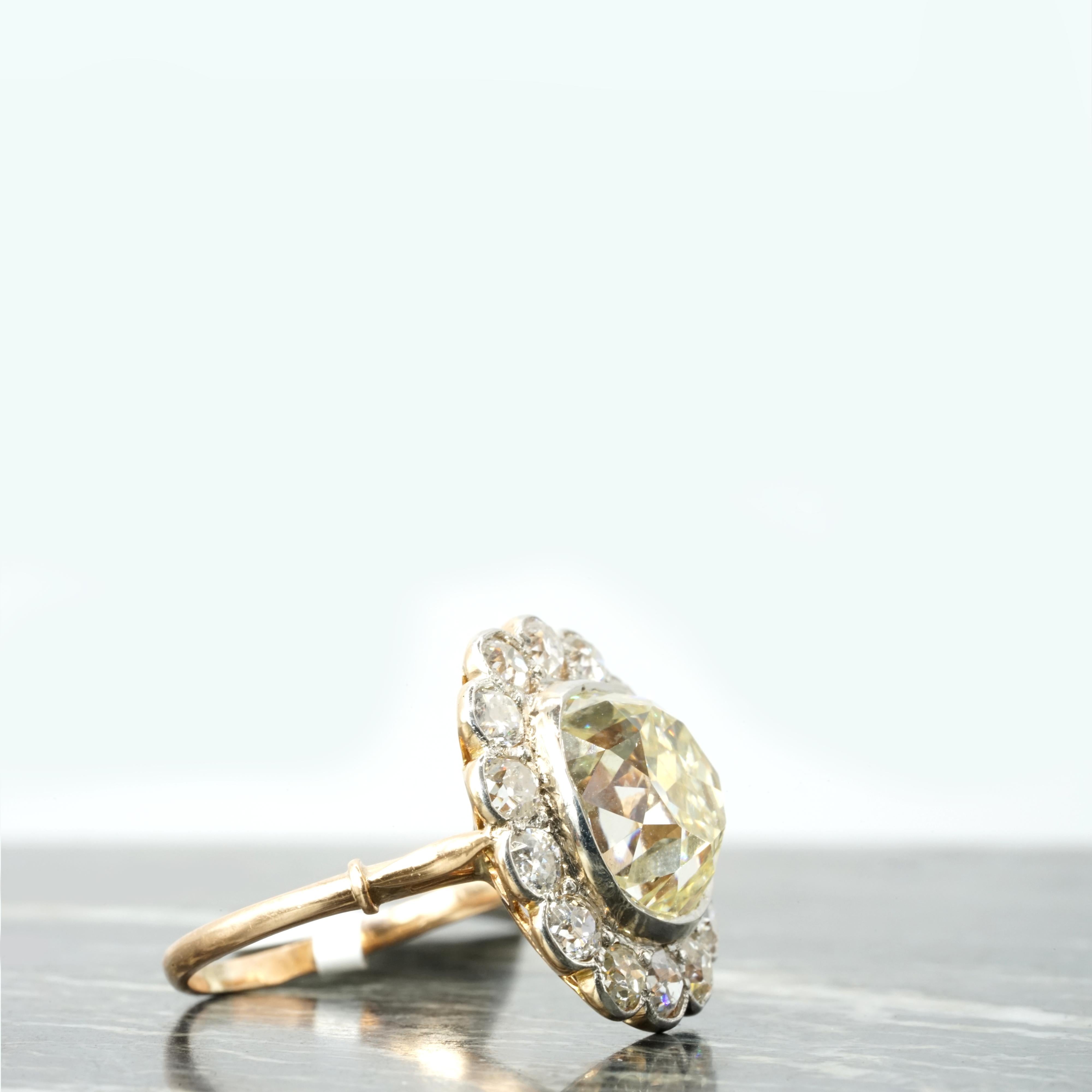 Step into the grandeur of vintage jewelry with this extraordinary diamond ring. Featuring a massive 6.28-carat Old Mine Cut diamond at its center, this original vintage piece offers a glamorous and timeless appeal. The center diamond, GIA-certified,