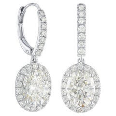 GIA-zertifizierte 6 Karat ovale Brillant-Diamant-Ohrringe aus Platin  Beschreibung: