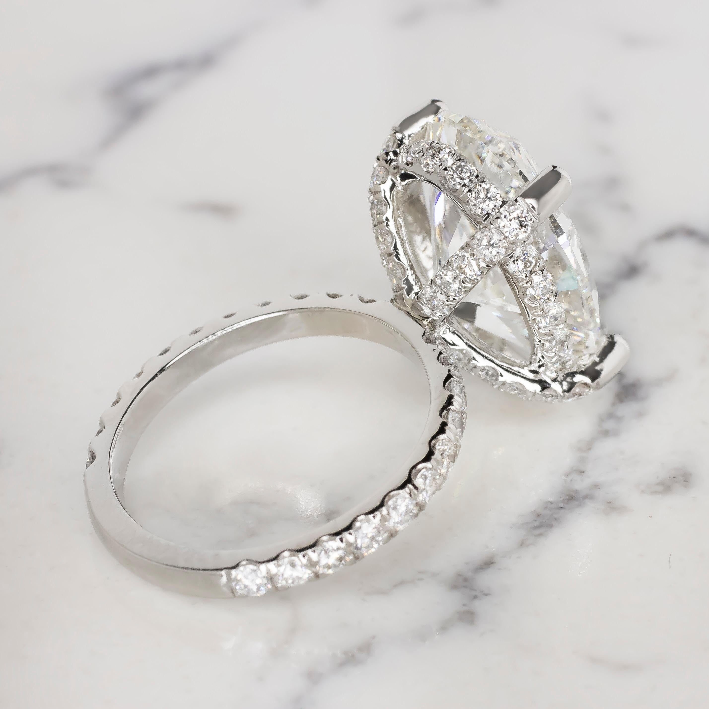 Contemporary GIA Certified 6.01 Carat Oval Cut F Color Diamond Ring in For Sale