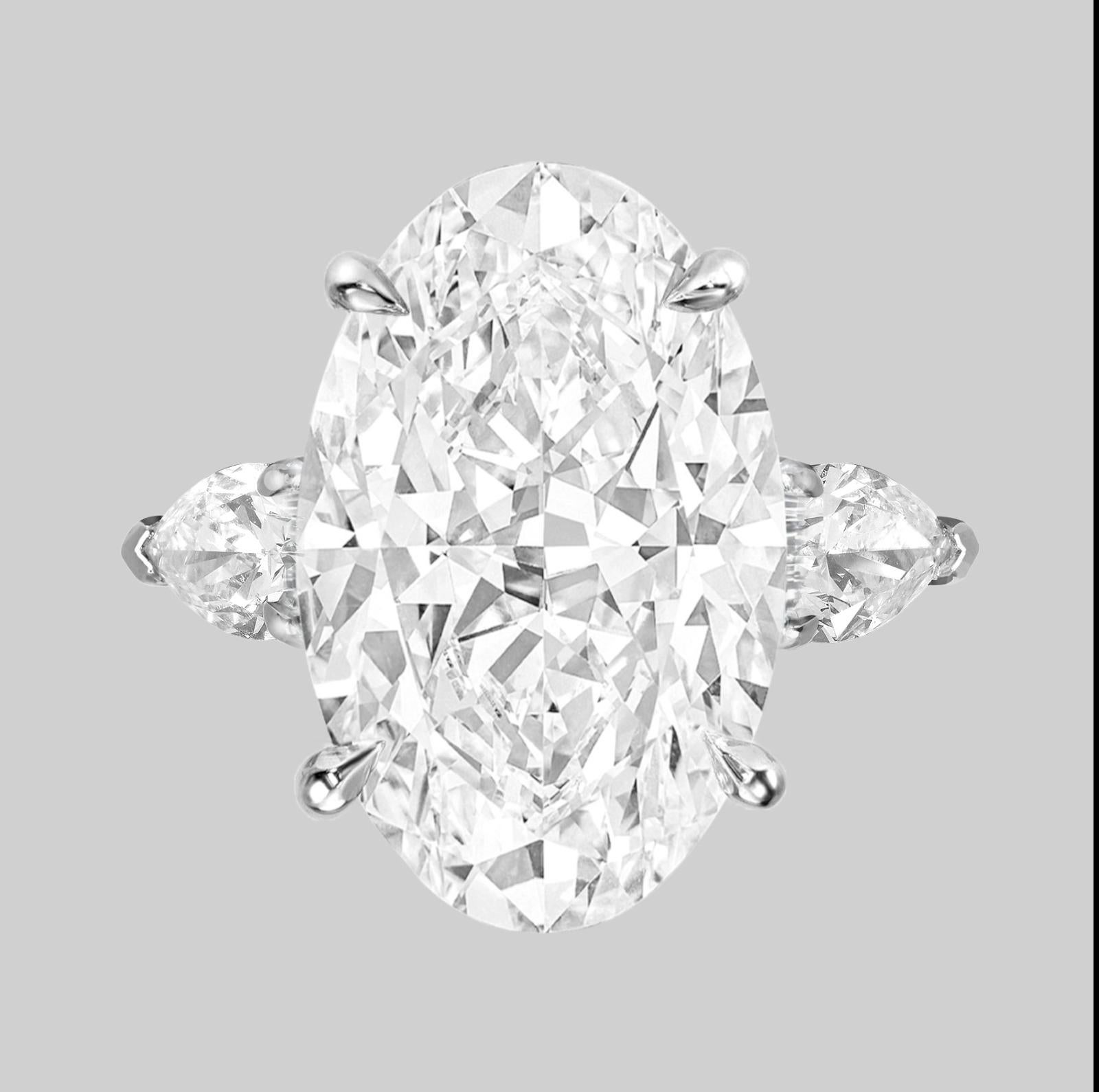 Presenting a remarkable GIA Certified 7.01 carat Oval Diamond Ring set in luxurious platinum. 
This exquisite ring features a stunning oval brilliant diamond as the centerpiece, meticulously graded by GIA.

With I color diamonds are near colorless,