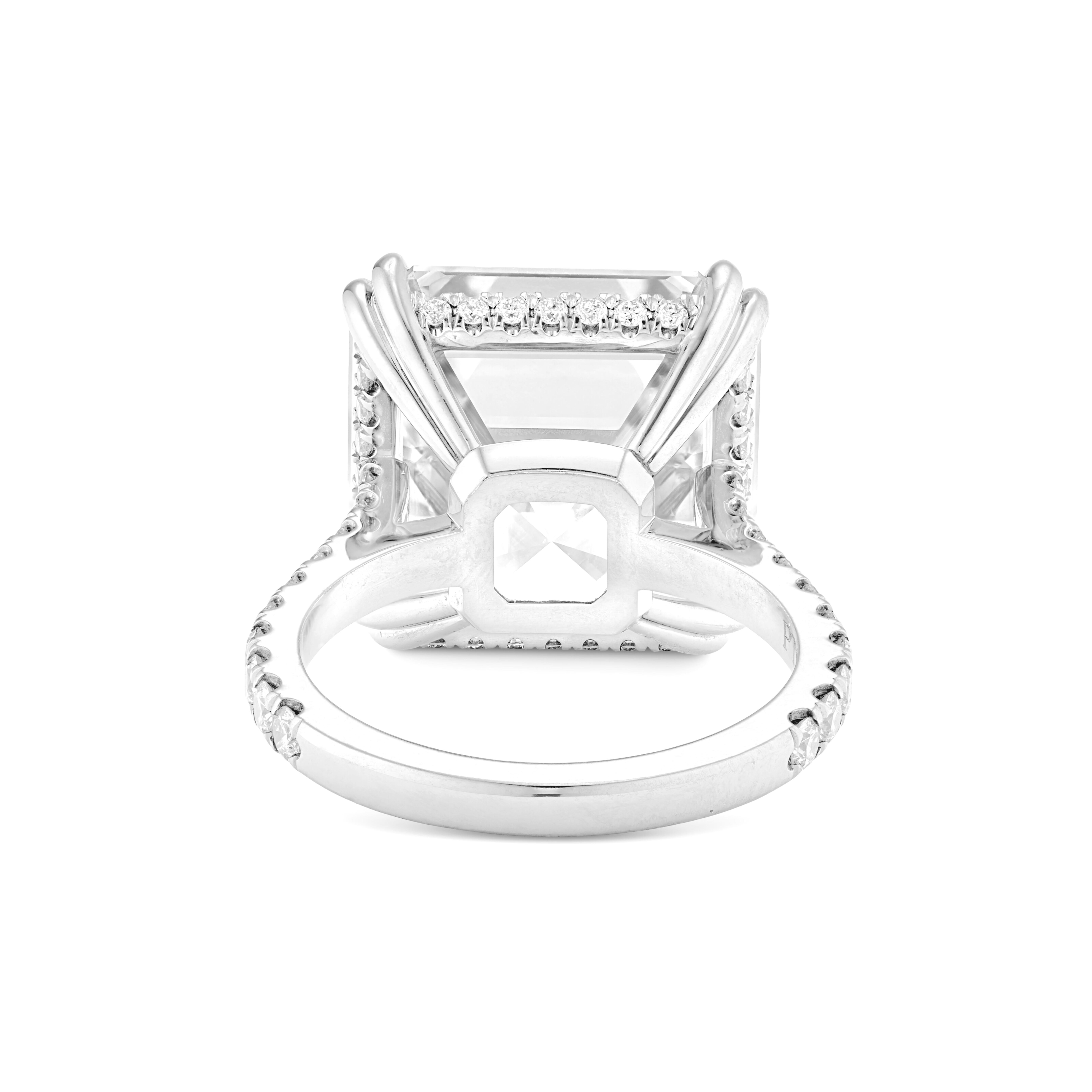 An exquisite 6 carat square emerald cut diamond ring set with two pear cut diamonds all h color vs1 in clarity
the ring is set in solid platinum
size 7
