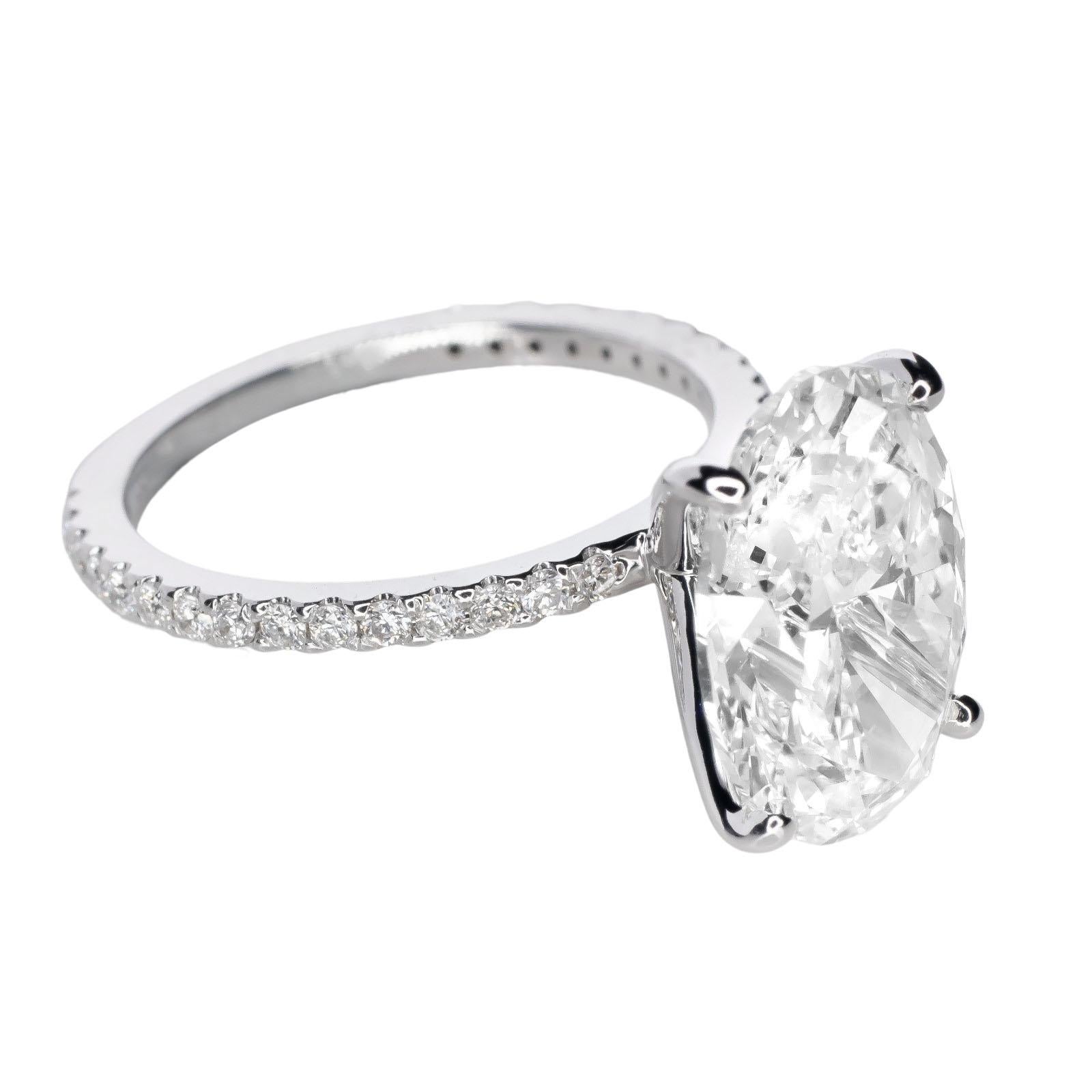 Modern GIA Certified 6 Carat VVS1 Oval Diamond Ring For Sale