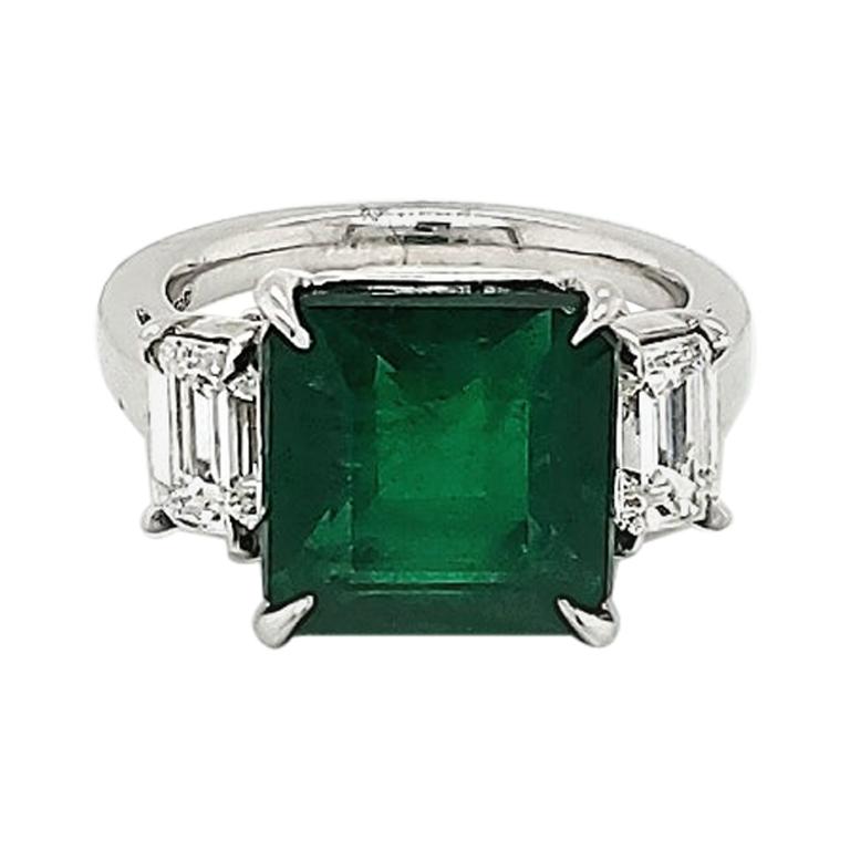 GIA Certified 6.00 Carat Emerald & 1.00 Carat Diamond Platinum Three-Stone Ring