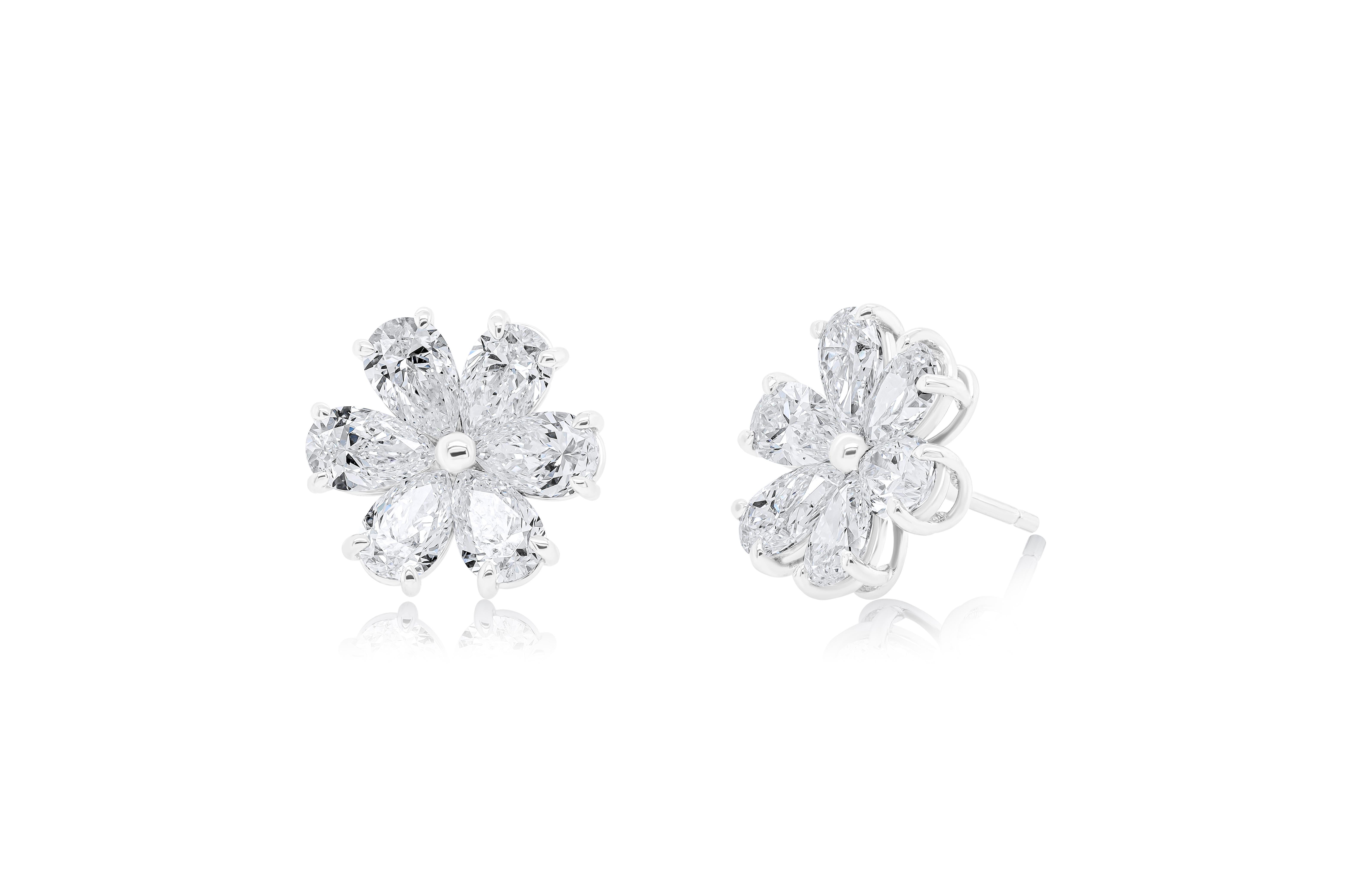 18KT White Gold DIamond Flower Earrings features all GIA Certified Diamonds total diamond weight 6.01 Carats D - G in Color VS-SI in Clarity Each diamond comes with GIA Report