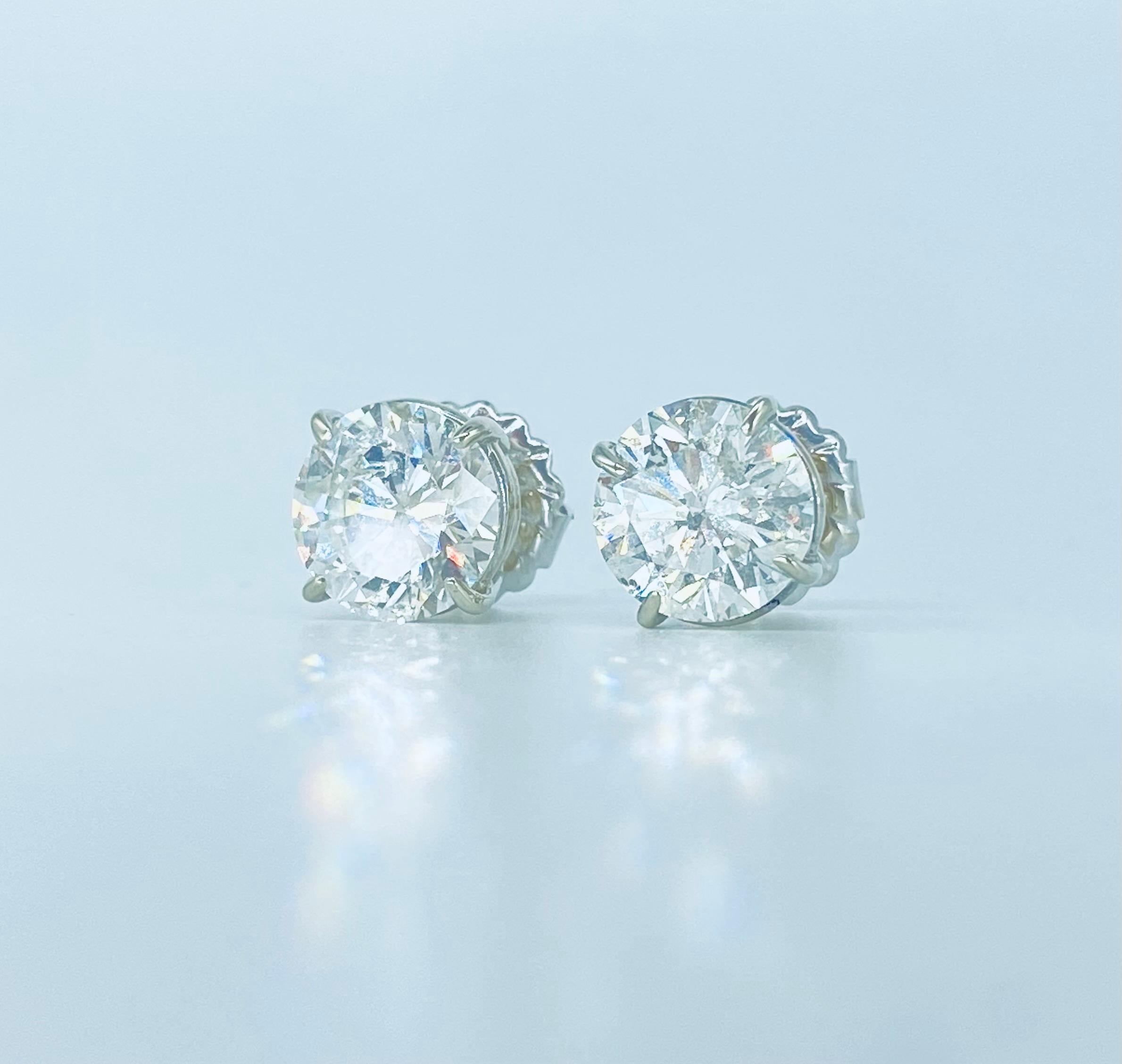 GIA Certified 6.00 Carat Round Brilliant Natural Diamonds Earrings For Sale 4