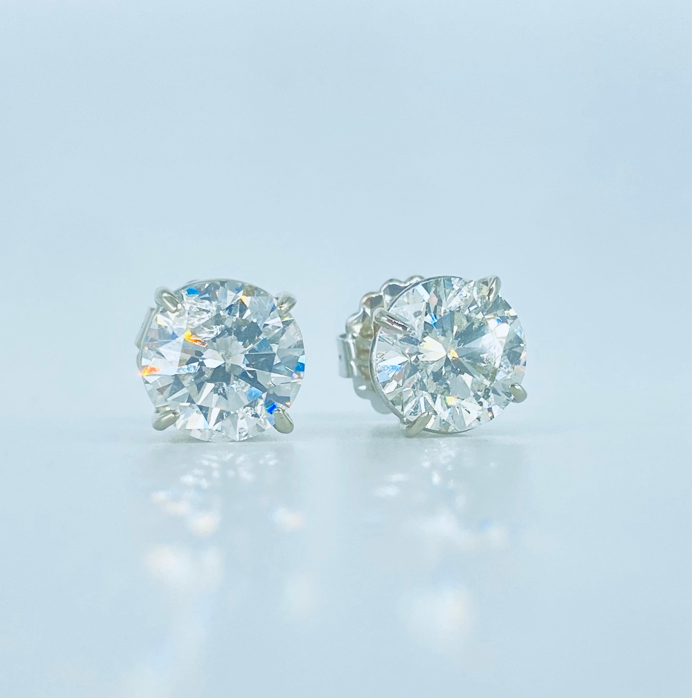 GIA Certified 6.00 Carat Round Brilliant Natural Diamonds Earrings For Sale 2