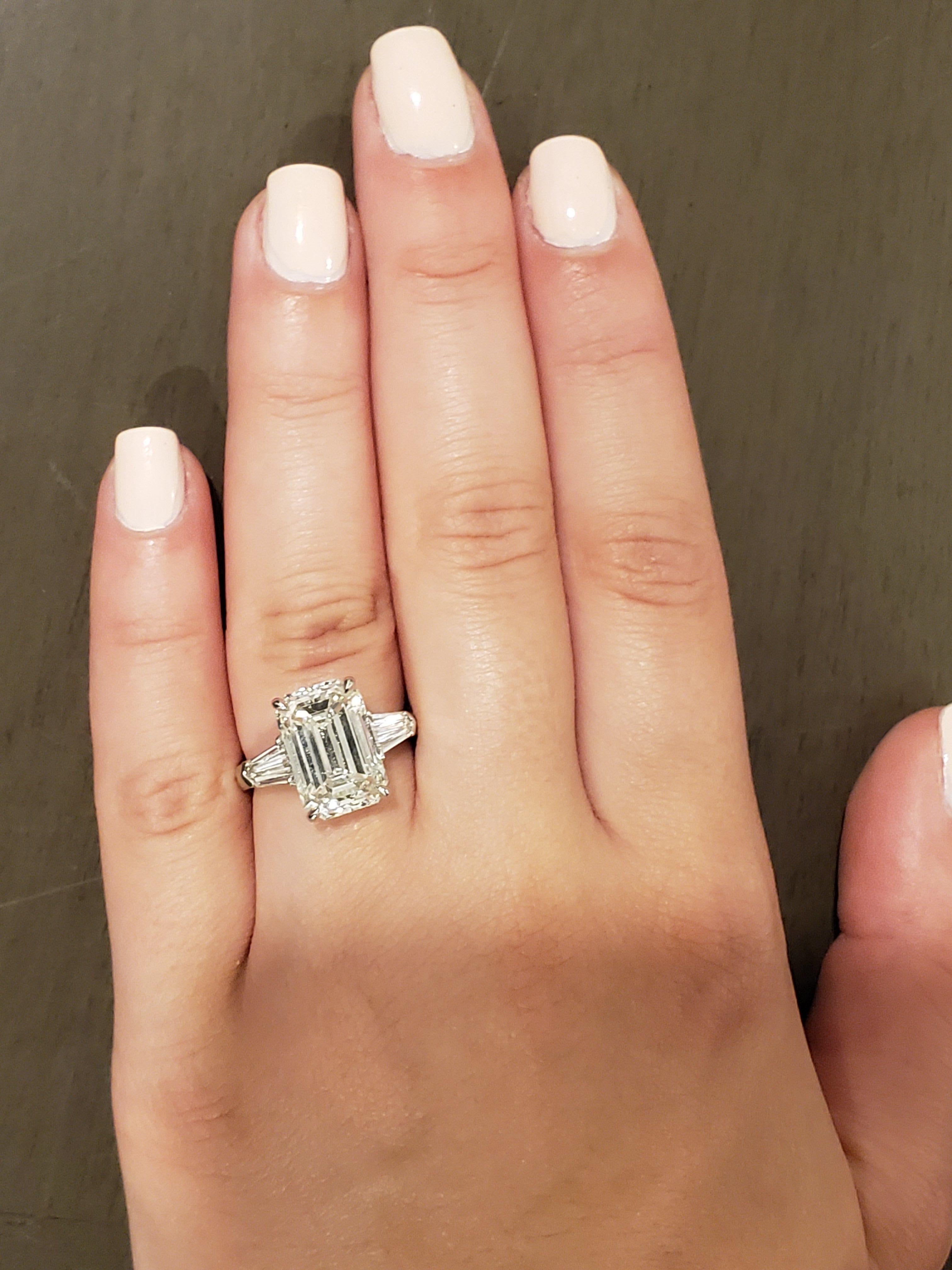 GIA Certified 6.01 Carat Emerald Cut Three-Stone Ring 2