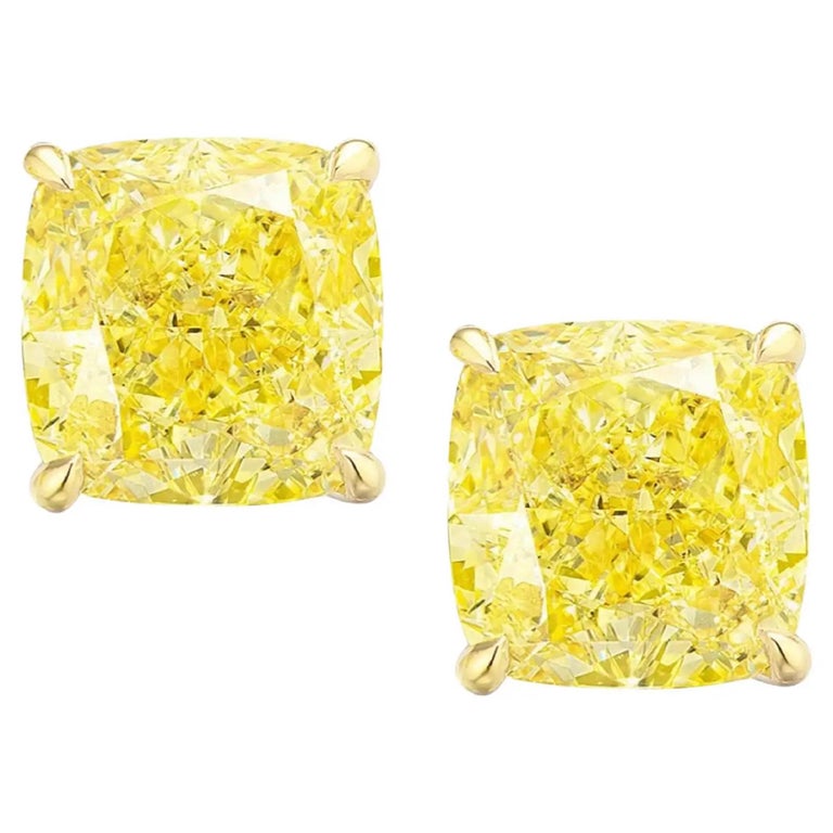 GIA Certified 6.01 Carat Fancy Intense Yellow Diamond Studs 