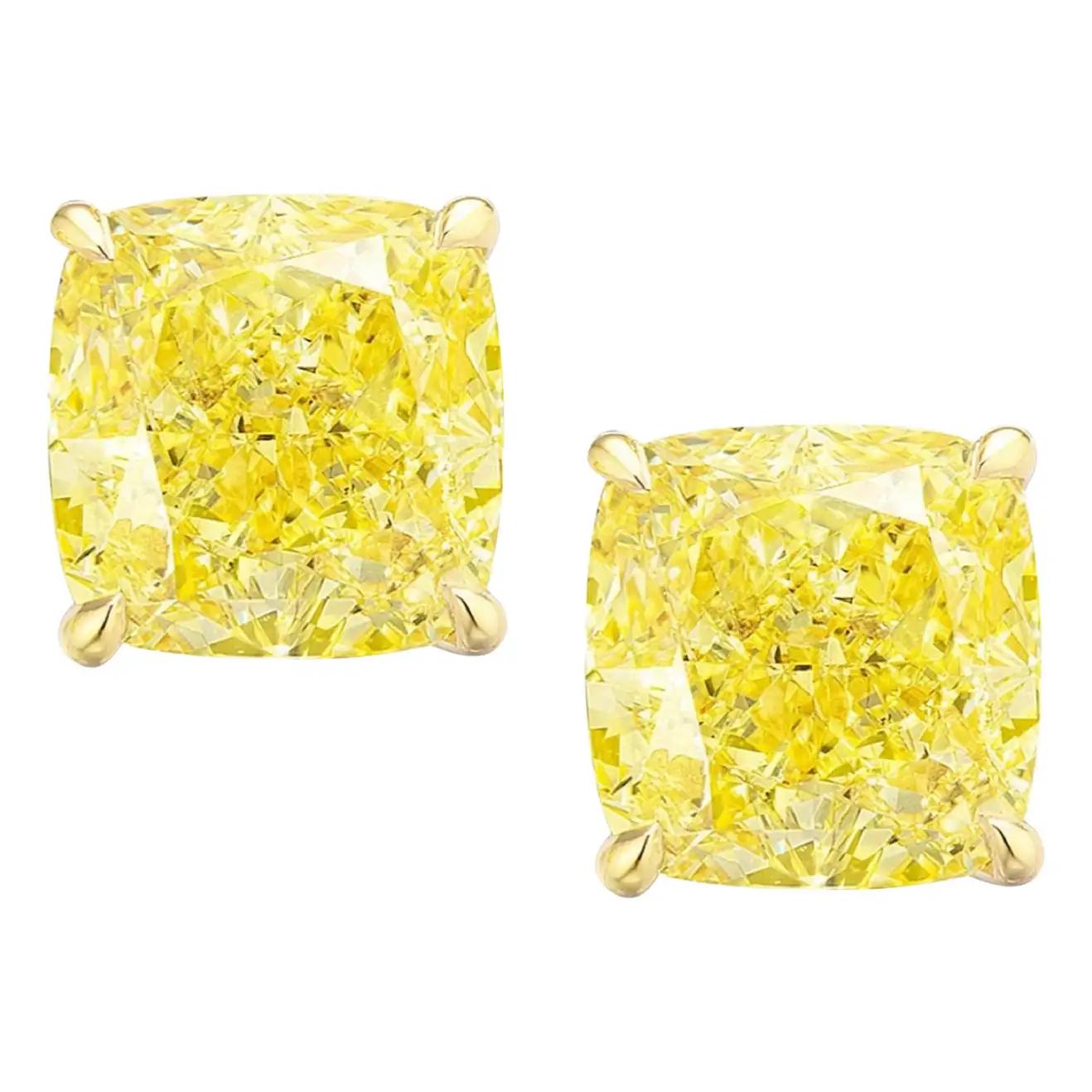 Modern GIA Certified 6 Carat Fancy Intense Yellow Diamond Studs For Sale