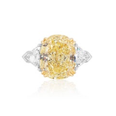 GIA Certified 6.01 Carat Fancy Yellow Cushion Cut Diamond Ring