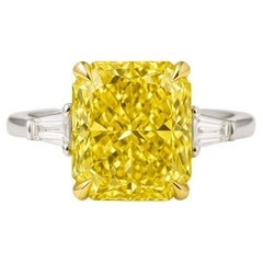 Anello con diamante giallo fantasia certificato GIA da 6,01 carati