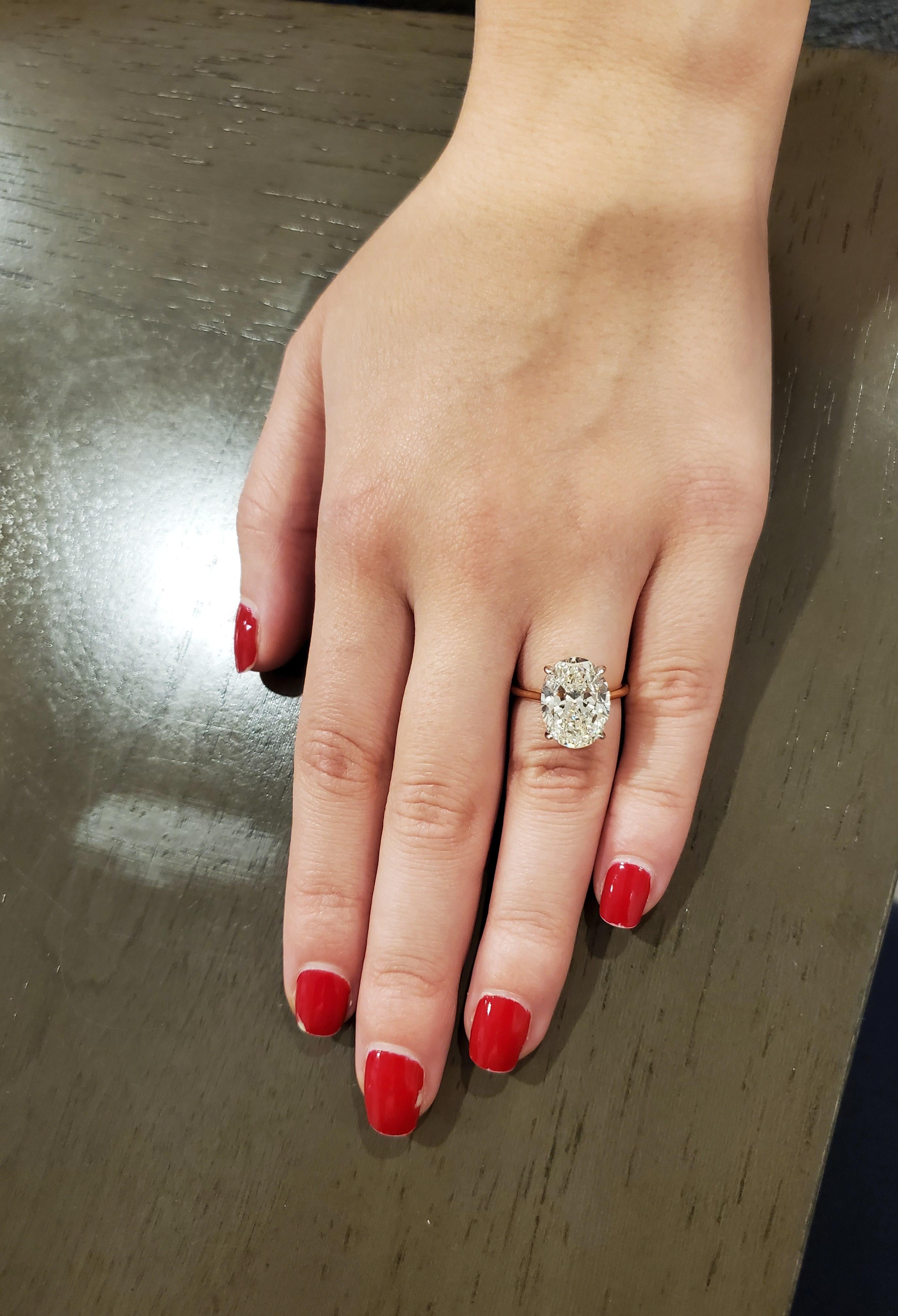 GIA Certified 6.01 Carat Oval Cut Diamond Ring In New Condition In New York, NY