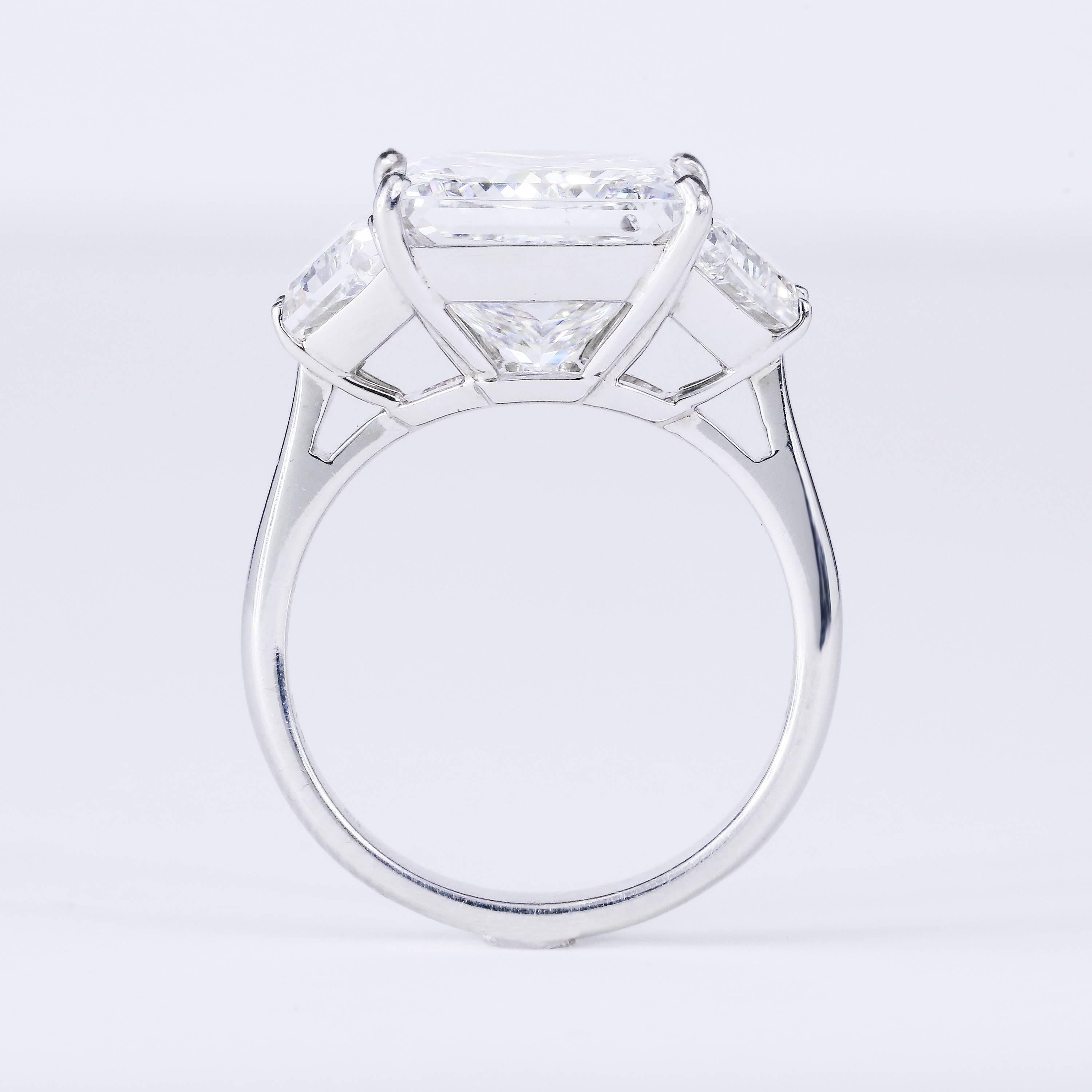 GIA Certified 6.01 Carat Princess Cut E SI1 Platinum Three-Stone Ring In New Condition In Chicago, IL
