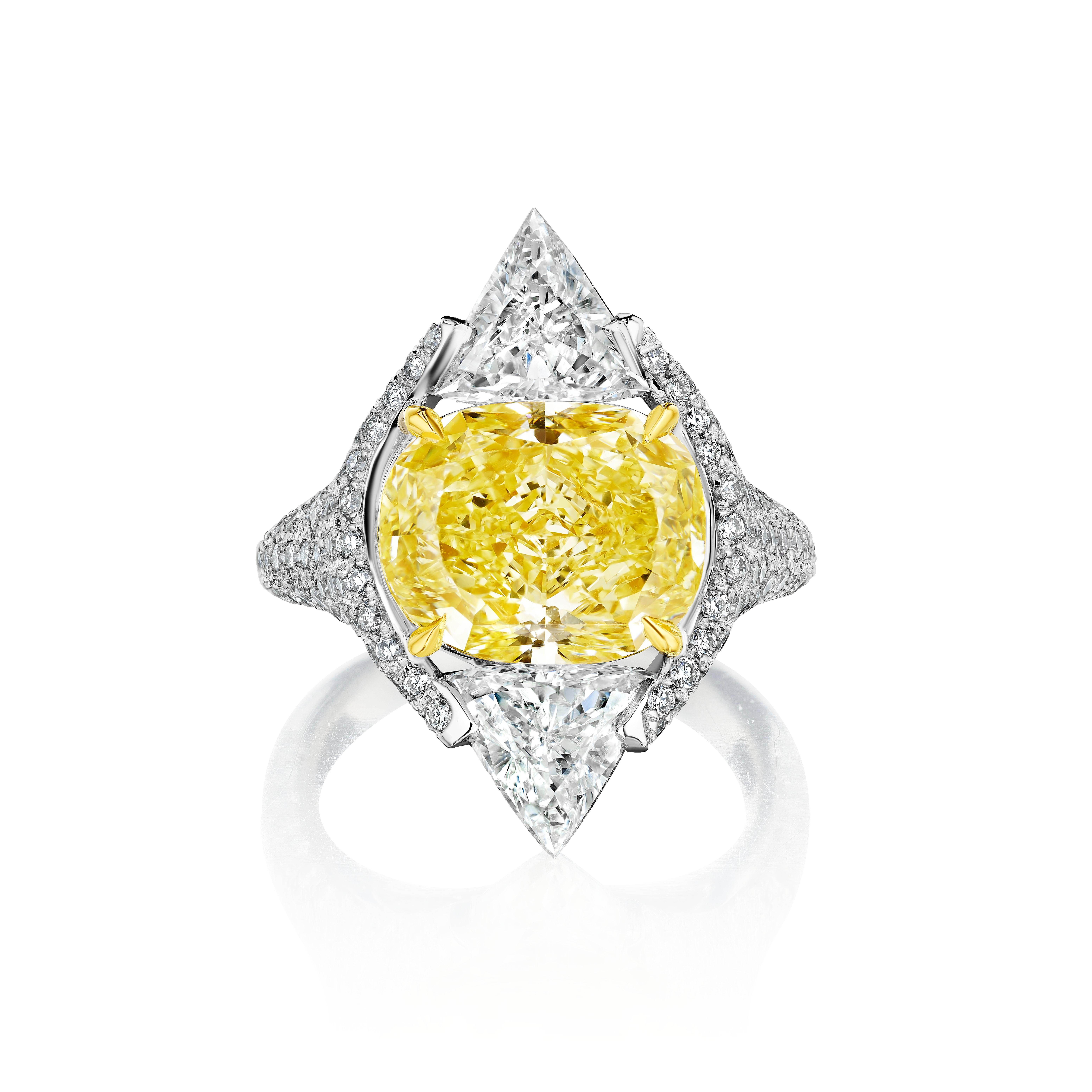 GIA Certified 6.01 Carat Yellow Diamond and Triangle Statement Ring In New Condition For Sale In New York, NY