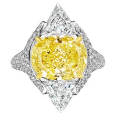 GIA Certified 6.01 Carat Yellow Diamond and Triangle Statement Ring