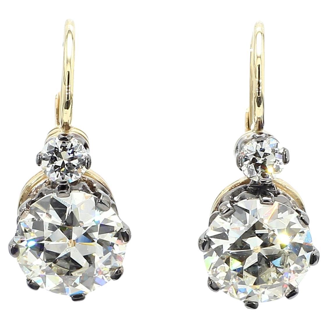GIA Certified 6.02 Carat Diamond Art Deco Style Earrings For Sale