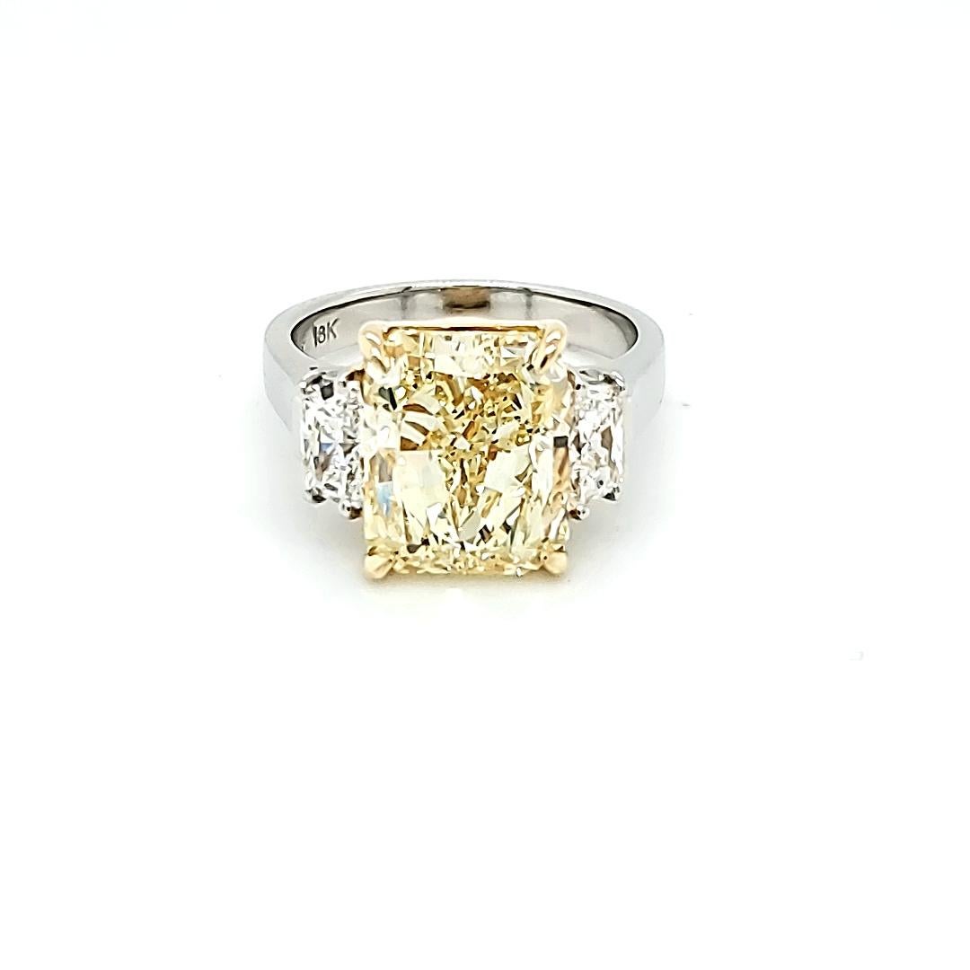 GIA Certified 6.02 Carat Fancy Yellow Radiant Cut Diamond Three-Stone Ring 2